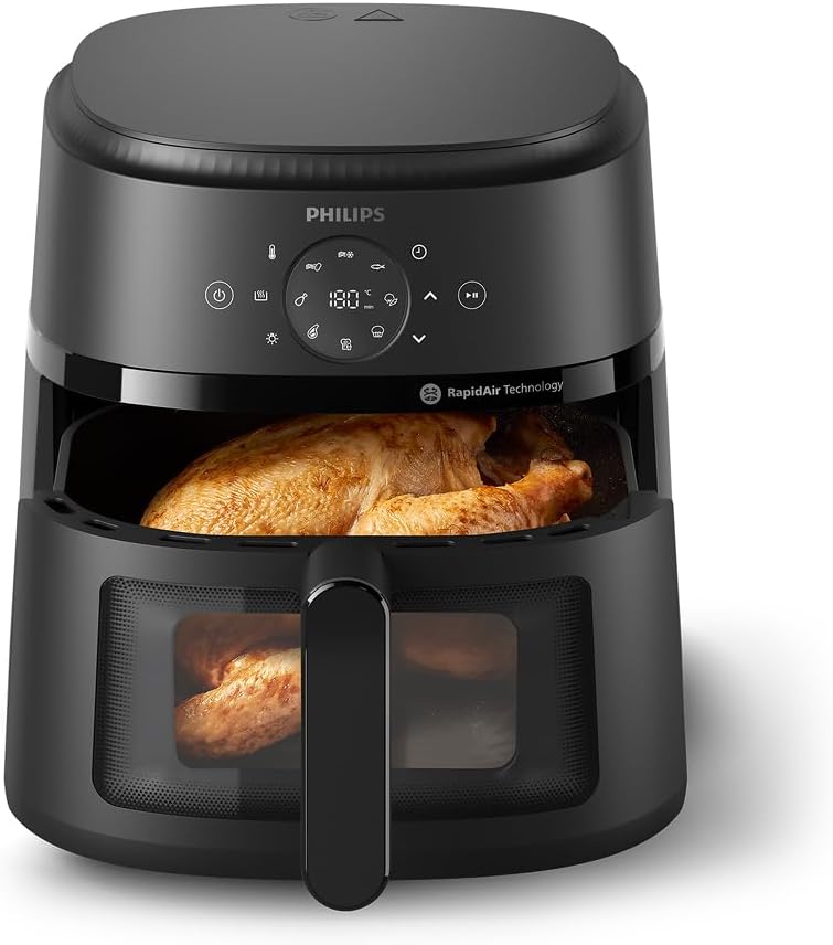 Airfryer Philips 2000 NA230 noir vu de trois quarts, son bandeau tactile affichant 180 degrés et sa fenêtre de cuisson laissant voir un poulet doré